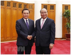 Thu_tuong__Khong_de_cac_the_luc_thu_dich_chia_re_quan_he_Viet_Lao